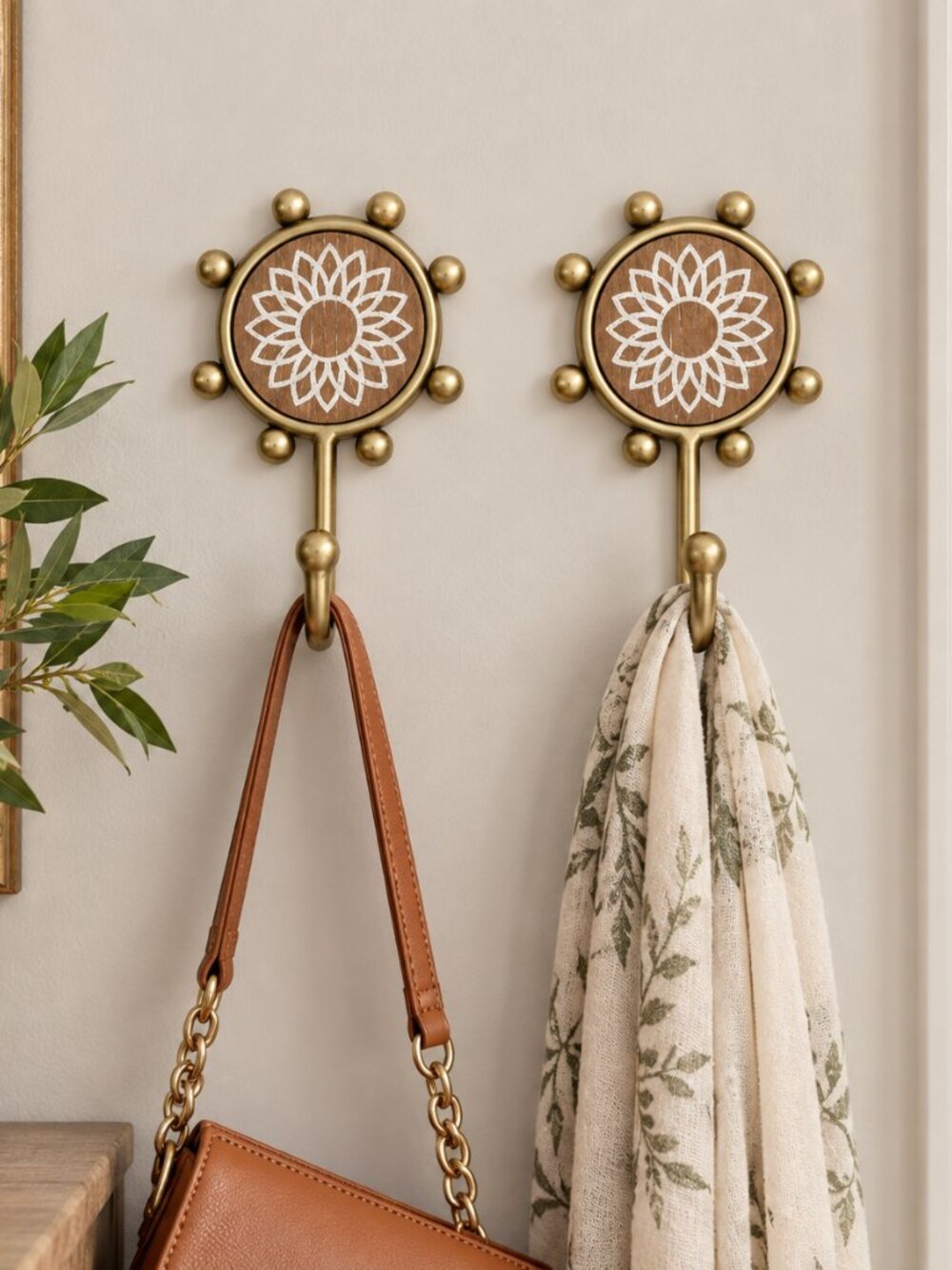 Wild Sage sunflower gold-toned decorative wall hooks with a carved wood accent